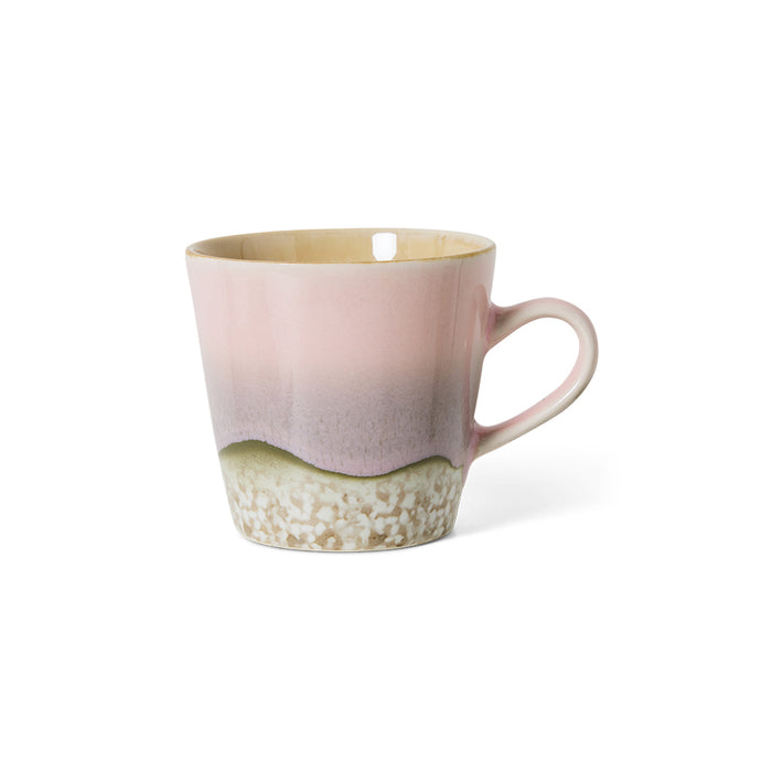 pink toned ceramic mug with ear on white background