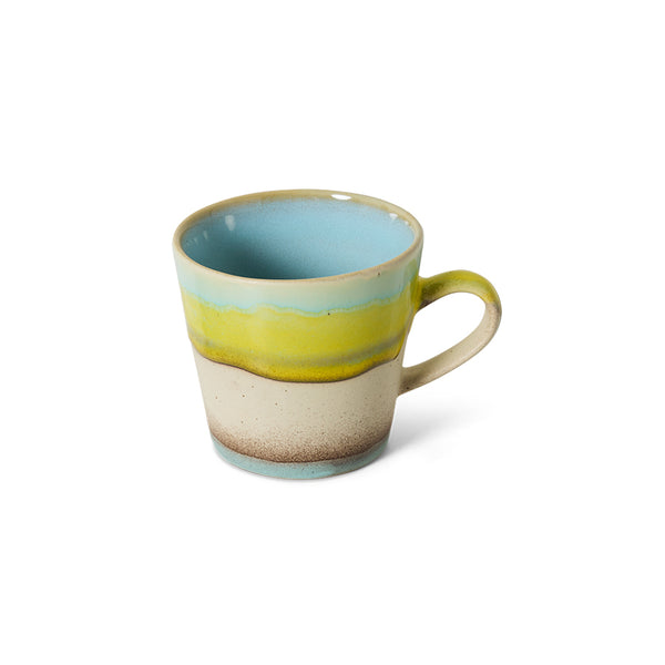 multi colored mug with ear on white background