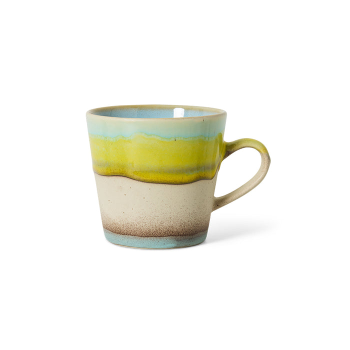 multi colored mug with ear on white background