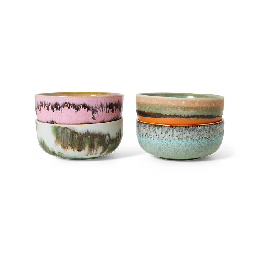 Two ceramic bowls with multicolored glazes on a white background