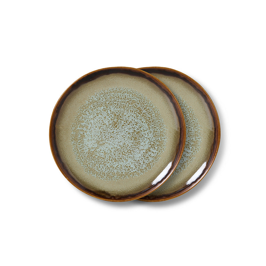 Two ceramic plates with a speckled design on a white background