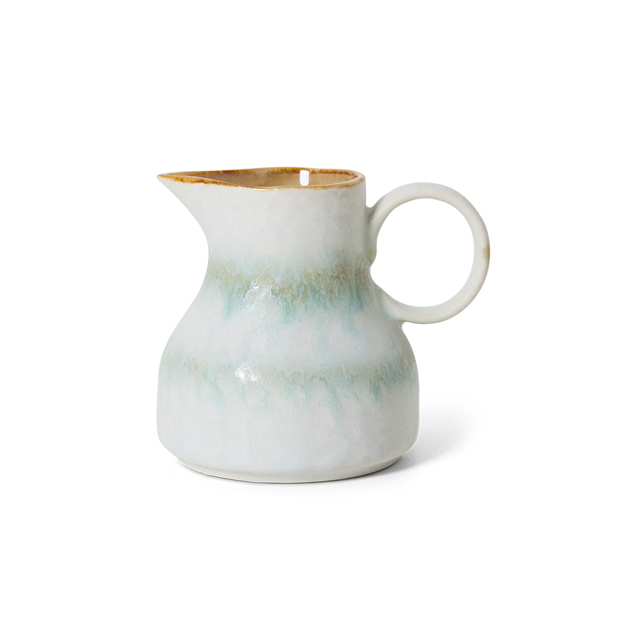small jar off white and soft blue on white background