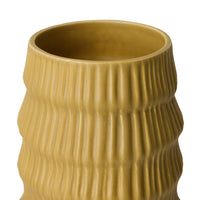 Yellow textured ceramic vase on a white background