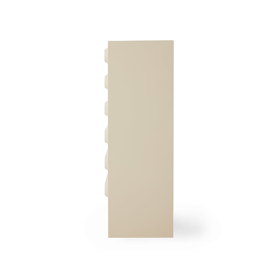 Beige rectangular object on a white background