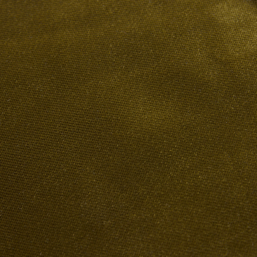 A close-up of a dark olive green woven fabric texture.