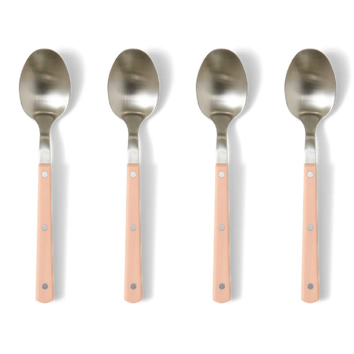 Four spoons with metallic heads and pink handles on a white background