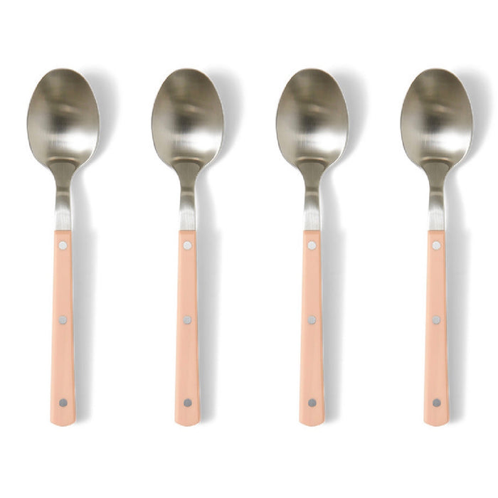 Four spoons with metallic heads and pink handles on a white background