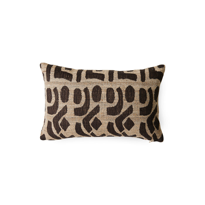 Decorative pillow with brown abstract pattern on beige background