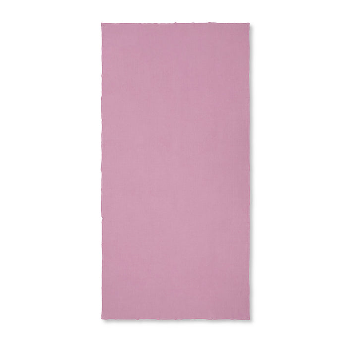 Solid pink tablecloth on a white background
