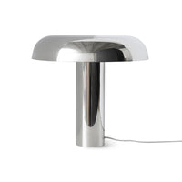 Modern silver table lamp on a white background