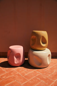 ceramic accent tables in pink, sand and cream