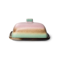 Butter dish with a gradient design on a white background