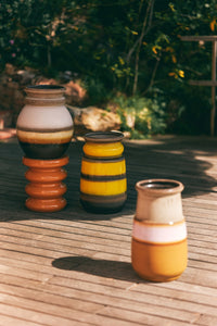 large, yellow and brown floor vase