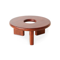 Wooden stool with a circular design on a white background