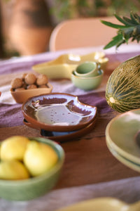 brown and blue organic shape ceramic plate