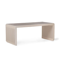 Compact bench with soft sand-colored painted surface