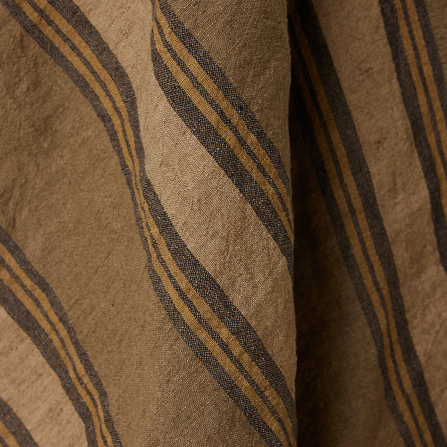 Close-up of brown fabric with striped pattern