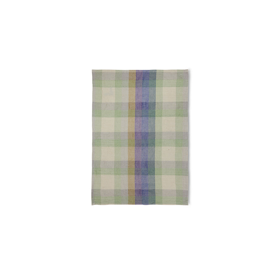 Plaid fabric swatch with green, purple, and beige colors on a white background