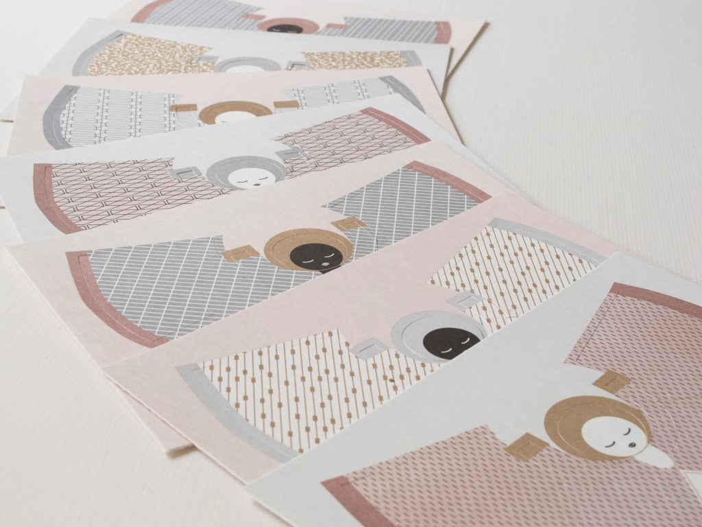 Set of decorative cards with geometric patterns and illustrations on a light background