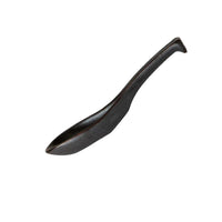 Black ladle on a white background