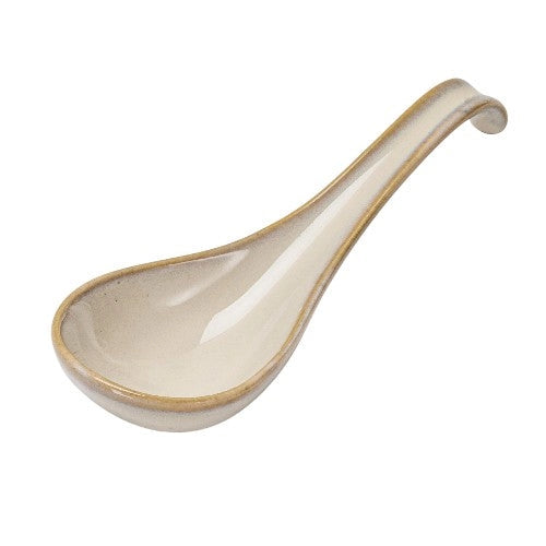 Ceramic ladle with a beige handle on a white background