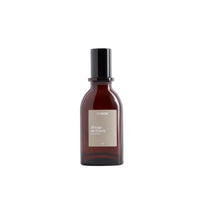 Brown bottle with black cap on a white background