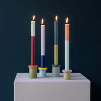 bold color blocking set of 4 candle stick holders with burning candles