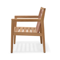 Wooden chair with woven backrest on a white background