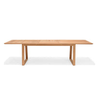 Wooden dining table on a white background