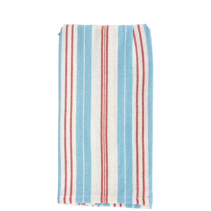 Striped towel with blue, red, and white pattern on a cardboard backing