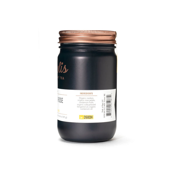 Black jar with a copper lid on a white background