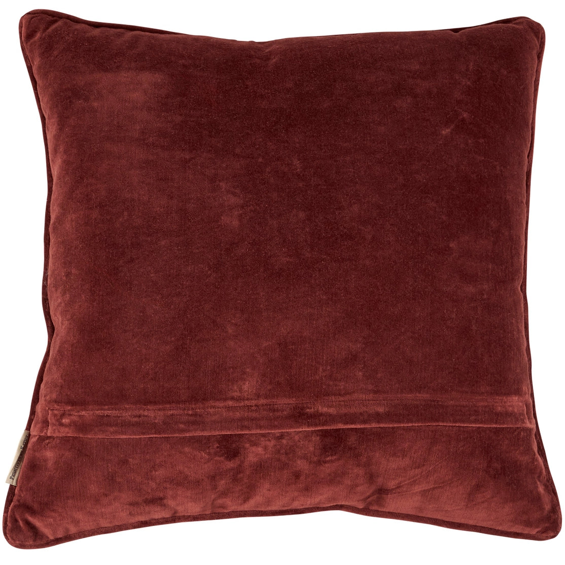 Red velvet pillow on a white background
