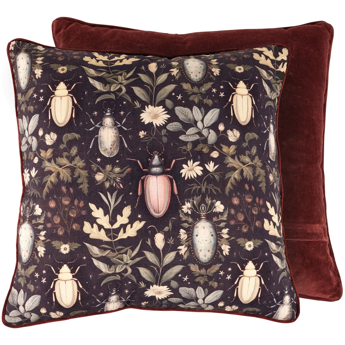 Decorative pillow with beetle and floral pattern on a dark background
