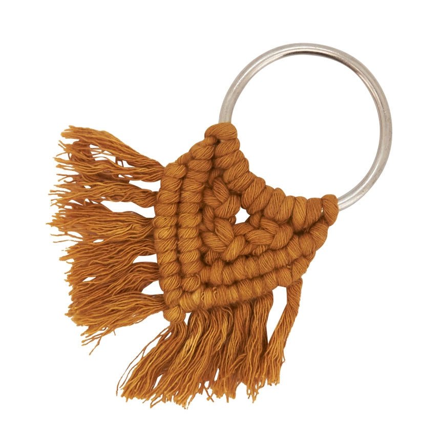 Brown macrame keychain with tassels on a white background