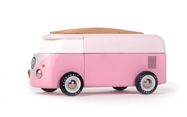 Pink and white toy van on a white background