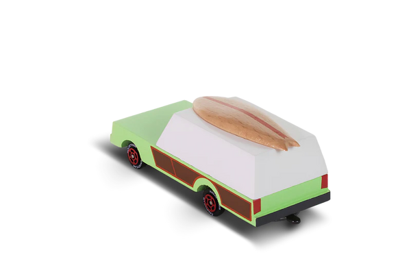 Toy van with a surf board on a white background