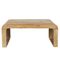 A low wooden table with a natural light oak finish, featuring a thick rectangular top with rounded corners and integrated block-style legs, shown against a plain white background.