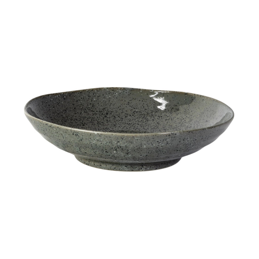 Black speckled ceramic bowl on a white background