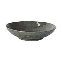 Black speckled ceramic bowl on a white background