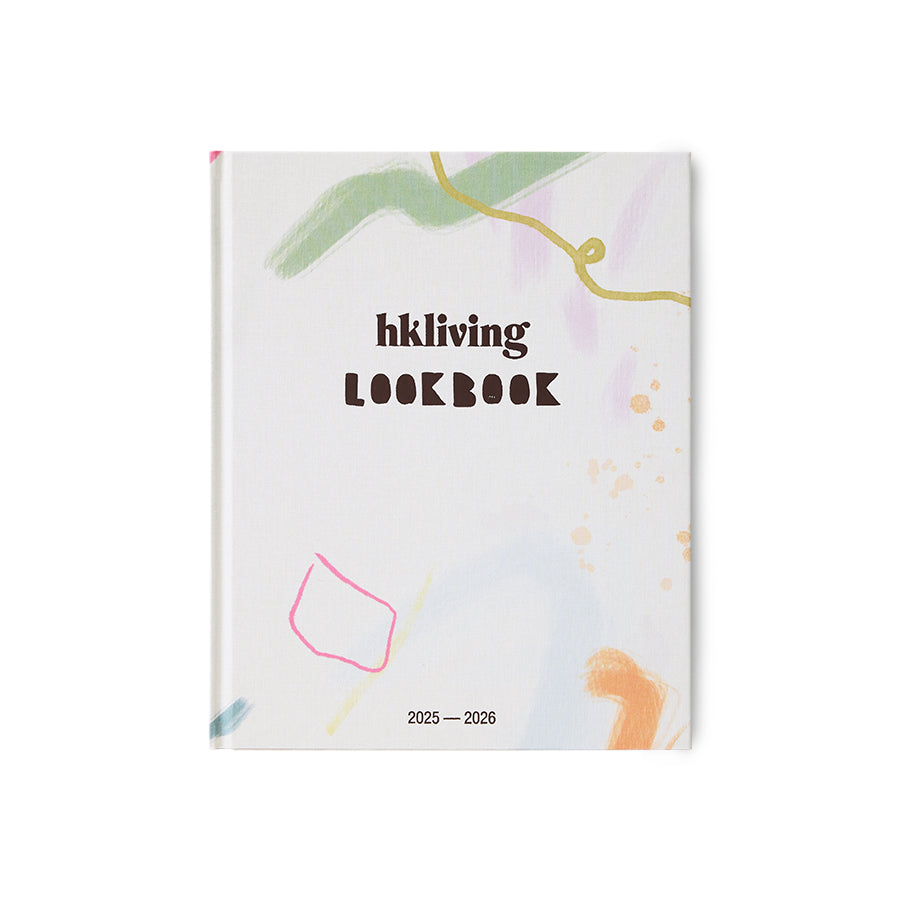 Notebook with colorful abstract designs and 'hkliving LOOKBOOK' text on a white background
