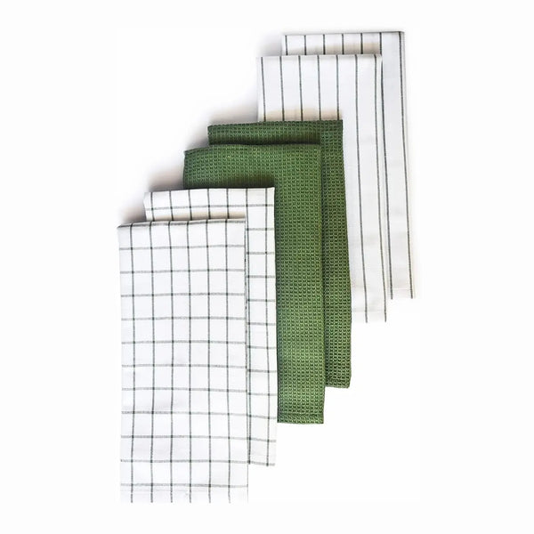 Set of green and white patterned cloths on a white background