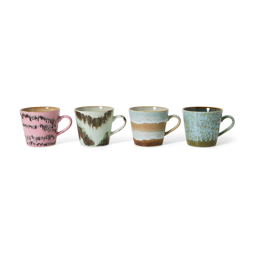 4 mugs with ears in different colors on a white background