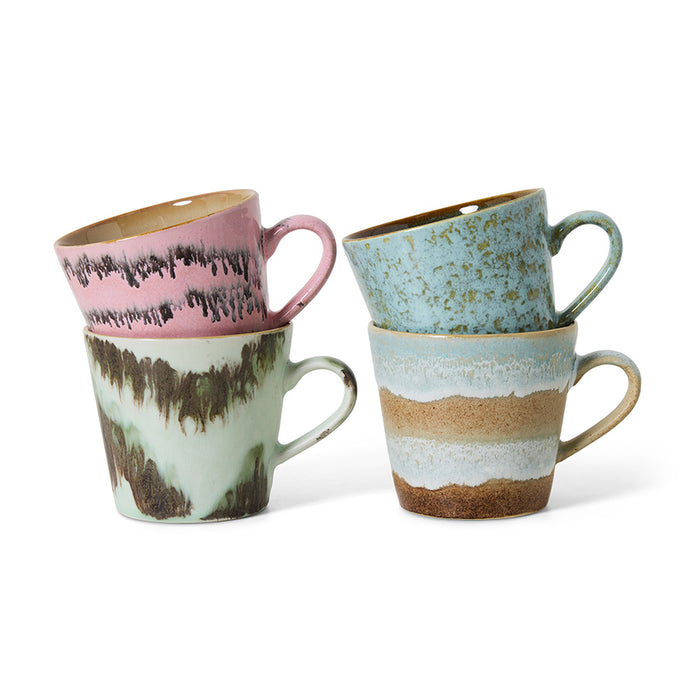 4 mugs with ears in different colors on a white background