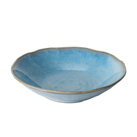 Blue ceramic bowl on a white background