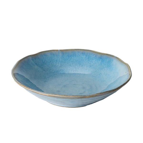 Blue ceramic bowl on a white background