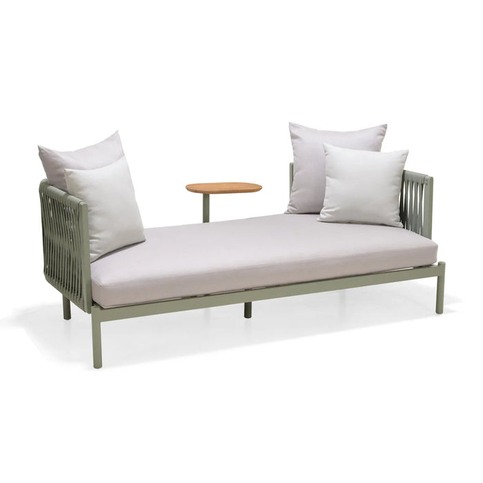 Modern outdoor sofa with cushions and a small table on a white background