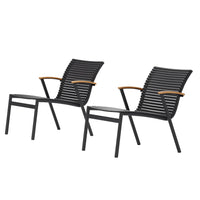 Two black outdoor chairs with wooden armrests on a white background