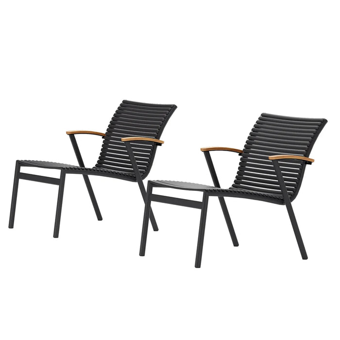 Two black outdoor chairs with wooden armrests on a white background