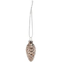 Decorative pine cone ornament on a white background