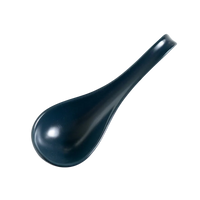 Dark blue spoon on white surface
